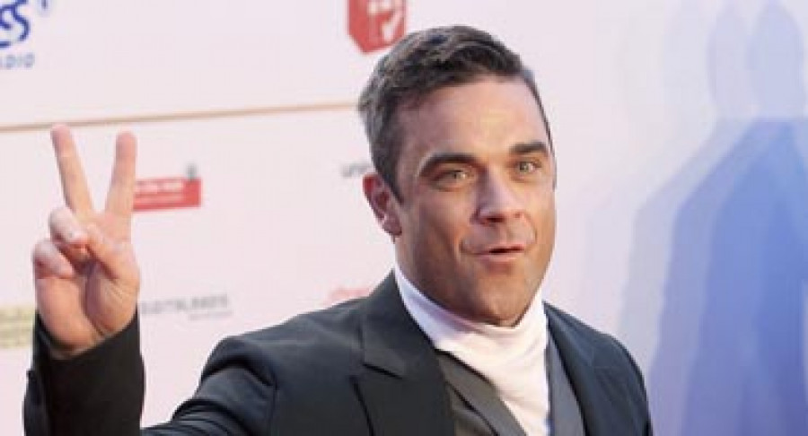 El cantante Robbie Williams anuncia el nacimiento de su hija, Theodora Rose