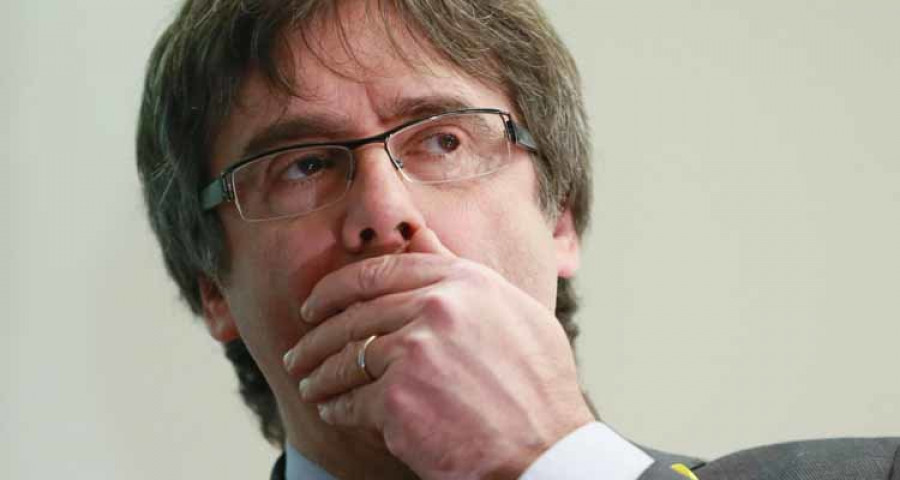 Puigdemont valora regresar a España tras el 21-D, pero asegura que no lo hará sin “garantías”