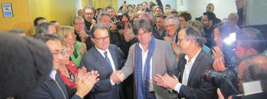 JxSí y la CUP llegan a un acuerdo para que Carles Puigdemont presida Cataluña