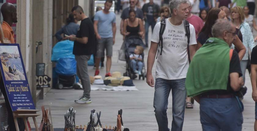 El Consistorio negociará con los manteros de la calle Real para trasladarlos de zona