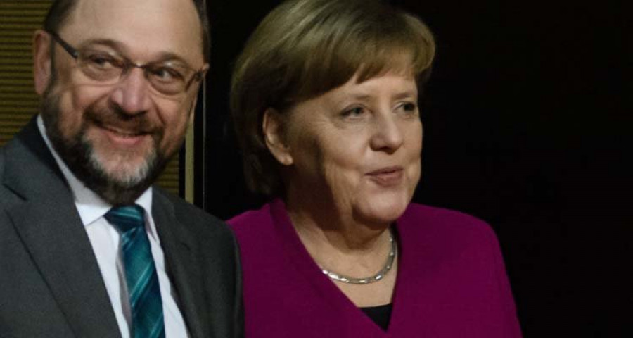 Merkel y Schulz tratan de superar los últimos escollos para formar la gran coalición