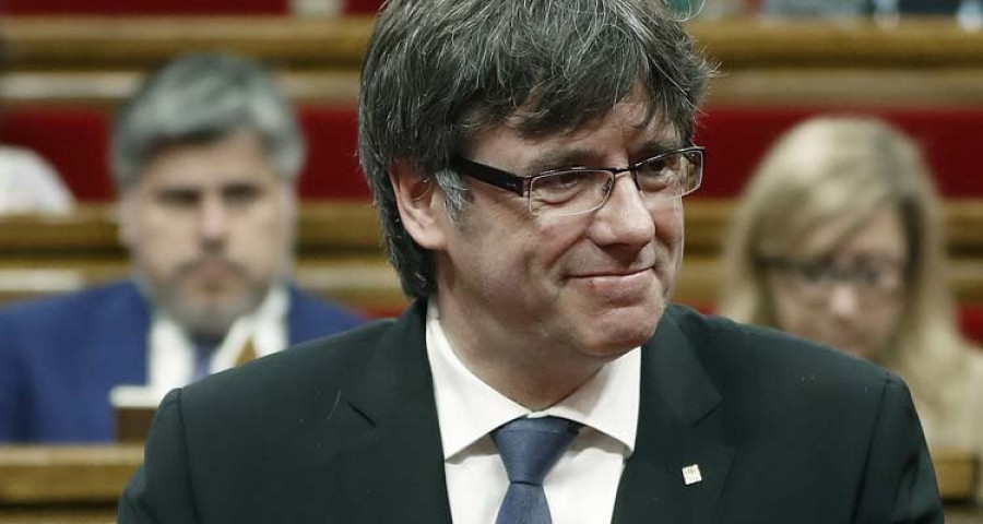 Puigdemont: las armas de Cataluña son el libro, la rosa y la cultura