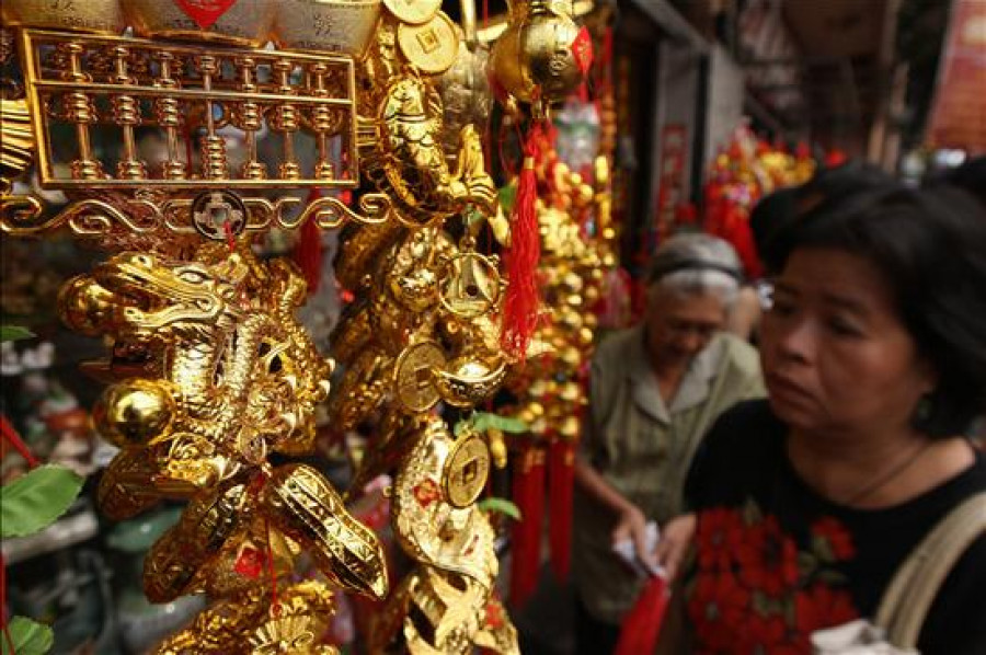 China da la bienvenida al año del dragón con una mezcla de ilusión y temor