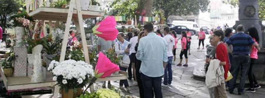 La Ciudad Vieja celebra con flores el adiós a los coches