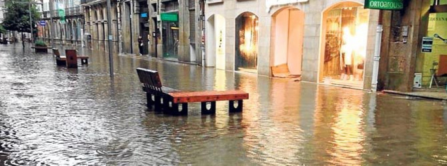 Una tromba de agua anega comercios y calles de Vilagarcía en cinco minutos