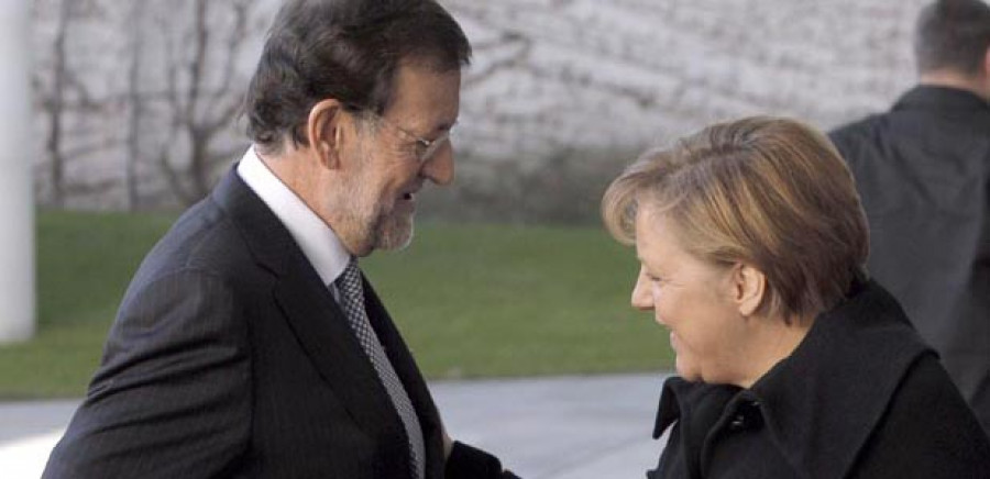 Rajoy y Merkel se reúnen en la Moncloa con los ojos puestos en el BCE