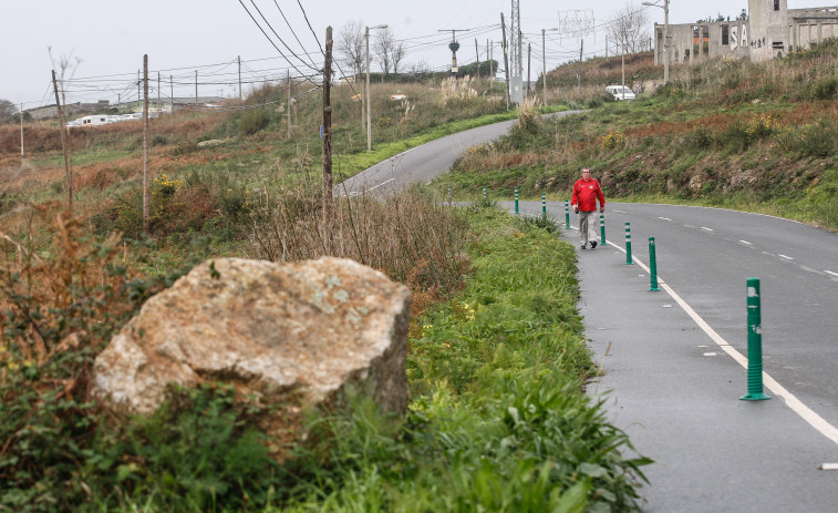 Los vecinos de varios barrios se unen para pedir mejoras en la carretera que va a O Portiño