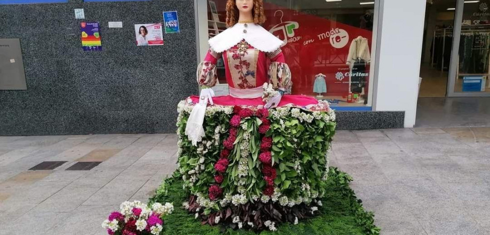 La Festa das Flores de Arteixo,  entre el credo, la música y ‘Os Maios’