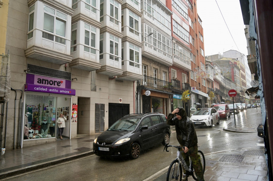 Paraguas y chubasqueros de regalo por comprar en el comercio de Monte Alto y Elviña