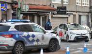 Un coche de la Policía Local de A Coruña embiste a un taxi